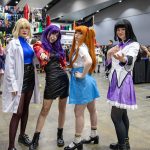 four females in cosplay