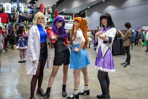 four females in cosplay